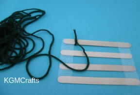 tie the yarn to a stick