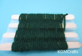 weave your yarn in and out of the sticks