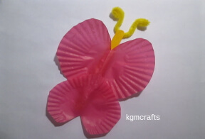 glue the cupcake liners to the craft stick