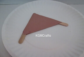 glue the paper to the sticks
