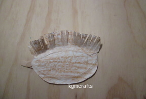 glue the piece to the egg shape