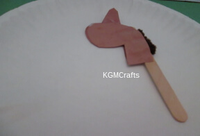 glue the head to the stick