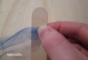 wrap the stick with tulle