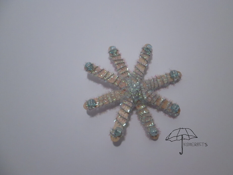 pipe cleaner wrapped around craft sticks Popsicle stick snowflake