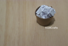 pot of gold step 1 add paper to the cardboard roll