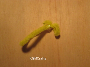 push the other end through the pony bead