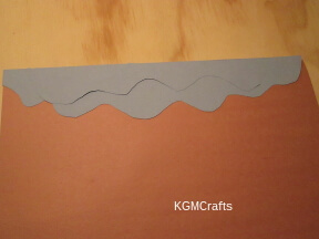 glue on the background piece