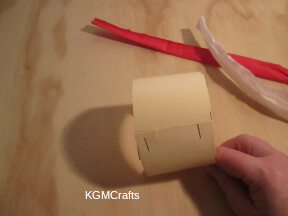 cake step 1 cut a piece of cardboard and roll some tissue paper
