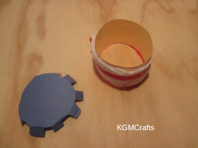 step 2 glue three of the strips to the cardboard and make a top for your cake