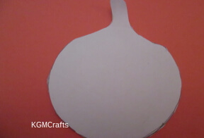 pumpkin rubbing step 1 cut a pumpkin shape