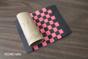 glue the woven piece to the cardboard tube