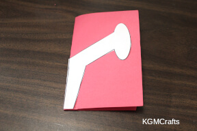 place on a folded red piece of paper