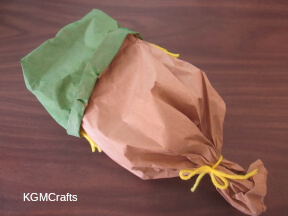 place the hat on the scarecrow