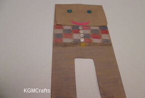 scarecrow step 2 add face and color bag