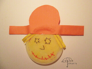 a sun catcher scarecrow