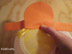 add the tissue and hat