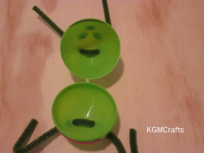 add pipe cleaners to hole in egg