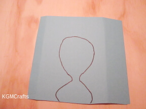 draw a shape on construction paper