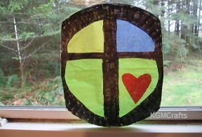 cut a tissue heart make a suncatcher cross