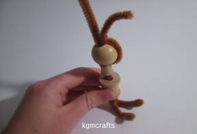 bend on pipe cleaner around and through bead
