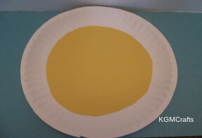 add yellow paper to plate