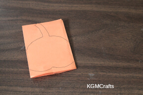 fold in thirds and draw a pumpkin