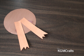 glue the feet to the back