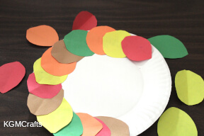 glue the leaves to the rim of the plate