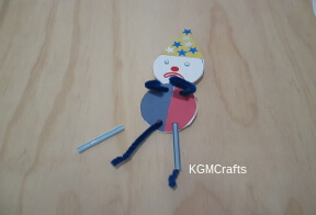 decorate clown and add straw legs