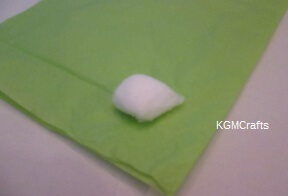 green tissue and cotton ball