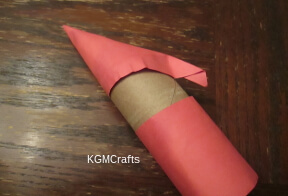 put hat on cardboard tube