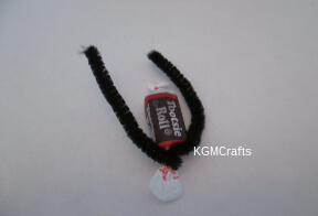 step 2 wrap pipe cleaner around candy