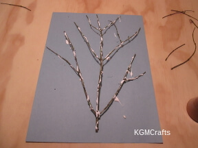 glue the branch to the paper