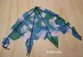 add yarn to the top of the umbrella