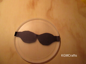 glue the glasses to the lid