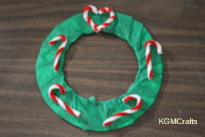 step 5 add the candy canes to the wreath