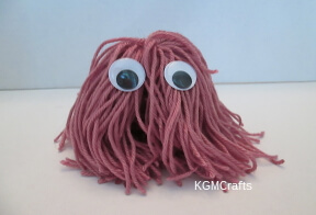 thumbnail of yarn mop monster