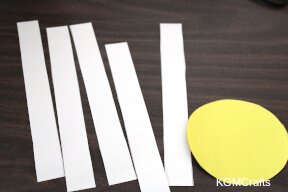 cut a circle and five strips of paper