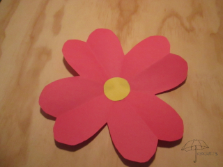 a folded paper flower